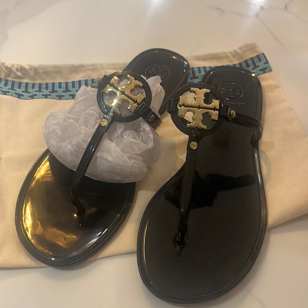 Tory Burch patent rubber flip flops